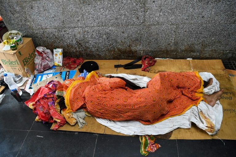Cancer patients have had to take shelter in a grimy pedestrian subway (AFP Photo/Prakash SINGH)
